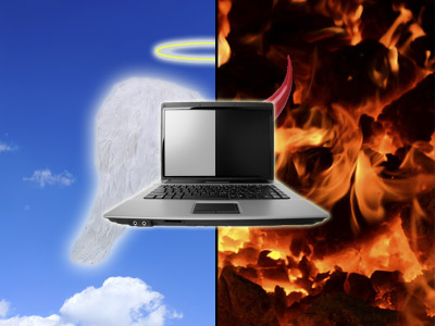 Laptop with half heaven and half hell background