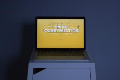 computer displaying "under construction" sign